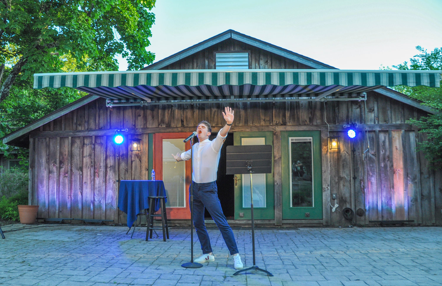 Like the proverbial Energizer Bunny, Jay Armstrong Johnson careened across the outdoor patio stage at the Forestburgh Playhouse last weekend.